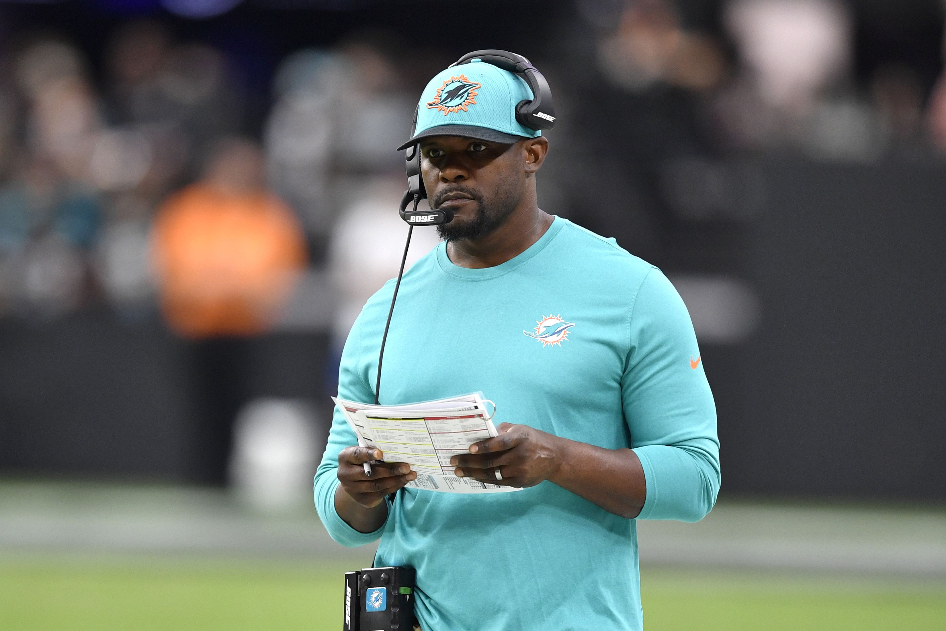 LAS VEGAS, NEVADA - SEPTEMBER 26: Head coach Brian Flores of the Miami Dolphins looks on during the second half of a game against the Las Vegas Raiders at Allegiant Stadium on September 26, 2021 in Las Vegas, Nevada. The Raiders defeated the Dolphins 31-28 in overtime.