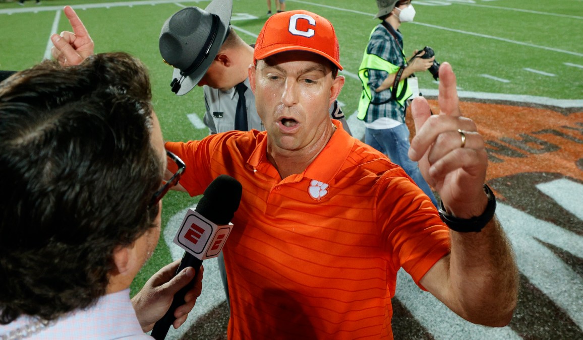 ORLANDO, FLORIDA - DECEMBER 29: Head coach Dabo Swinney of the Clemson Tigers is interviewed after defeating the Iowa State Cyclones in the Cheez-It Bowl Game at Camping World Stadium on December 29, 2021 in Orlando, Florida. (Photo by Douglas P. DeFelice/Getty Images)