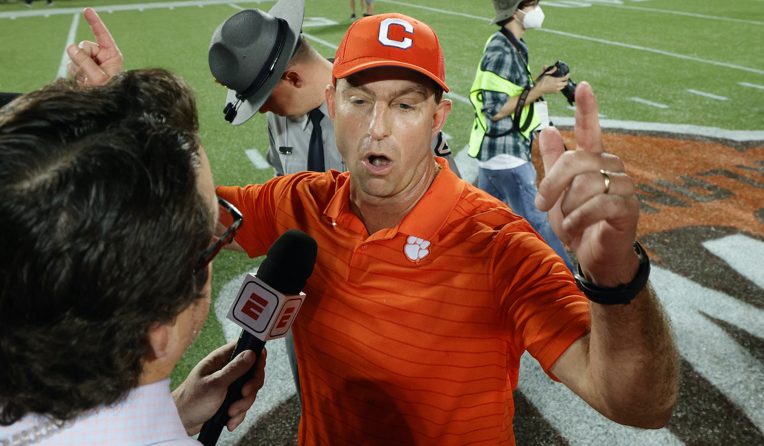 ORLANDO, FLORIDA - DECEMBER 29: Head coach Dabo Swinney of the Clemson Tigers is interviewed after defeating the Iowa State Cyclones in the Cheez-It Bowl Game at Camping World Stadium on December 29, 2021 in Orlando, Florida. (Photo by Douglas P. DeFelice/Getty Images)