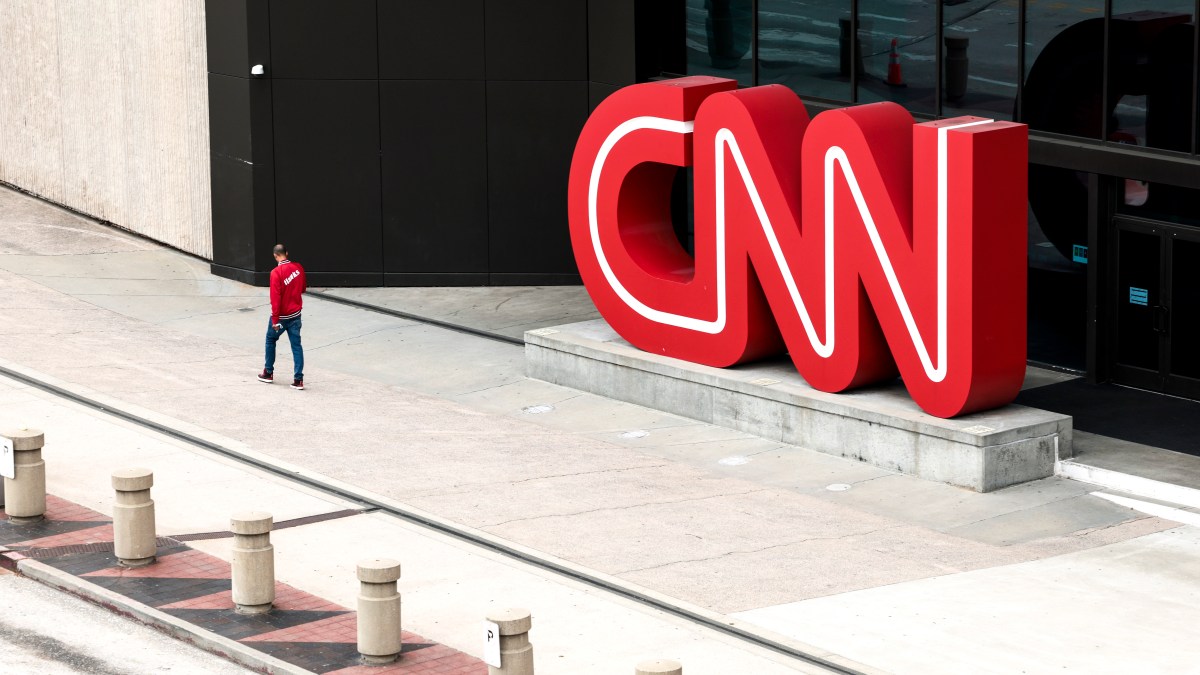 ATLANTA, GEORGIA - MARCH 15: People walk by the world headquarters for CNN on March 15, 2022 in Atlanta, Georgia. Last month CNN's president Jeff Zucker resigned over a consensual, but unreported, relationship with a colleague. Television producer Chris Licht will become the company's new president in April.