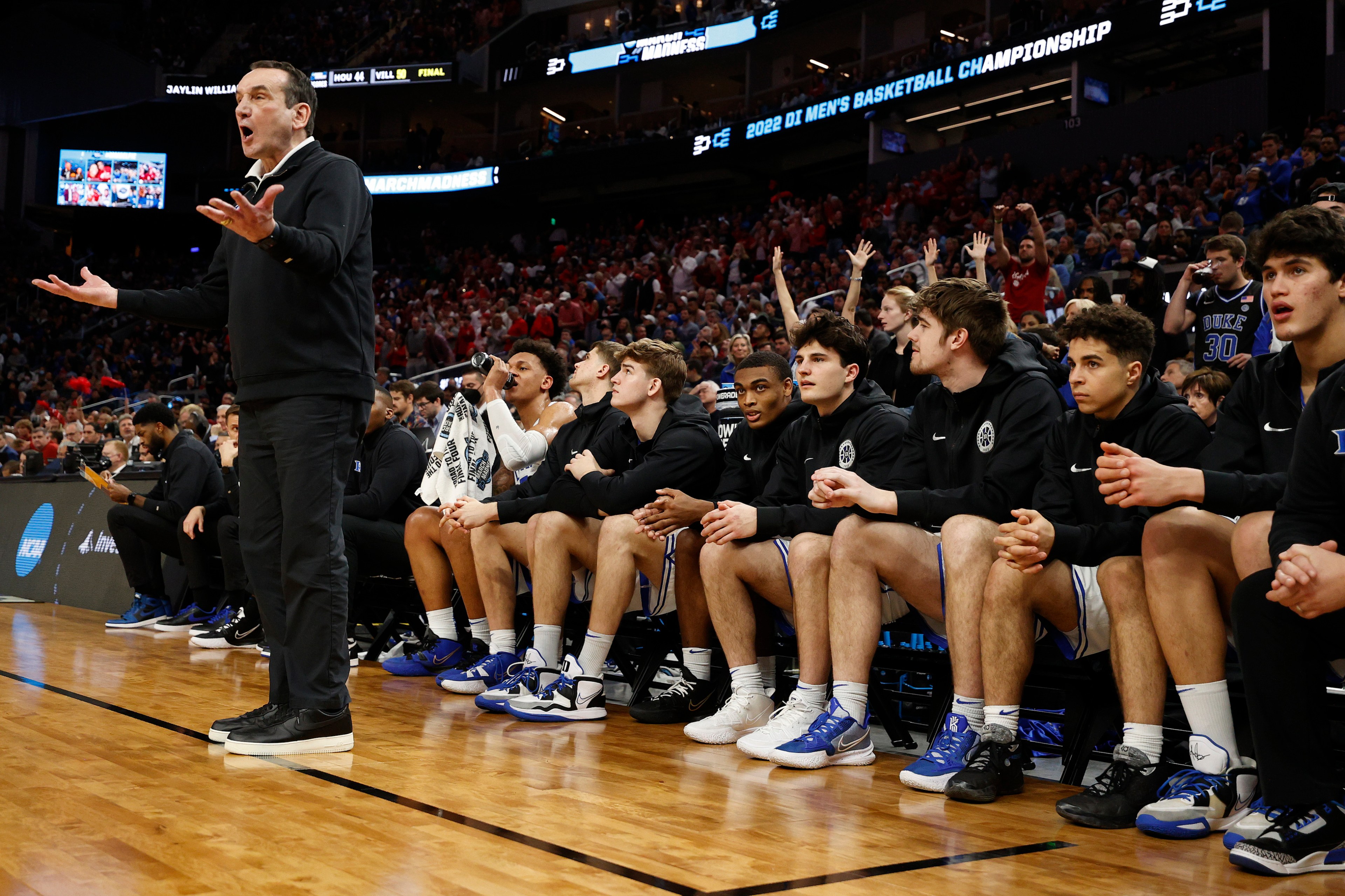 Coach K seen here complaining to officials in a game that could have been played any time in the last 40 years.