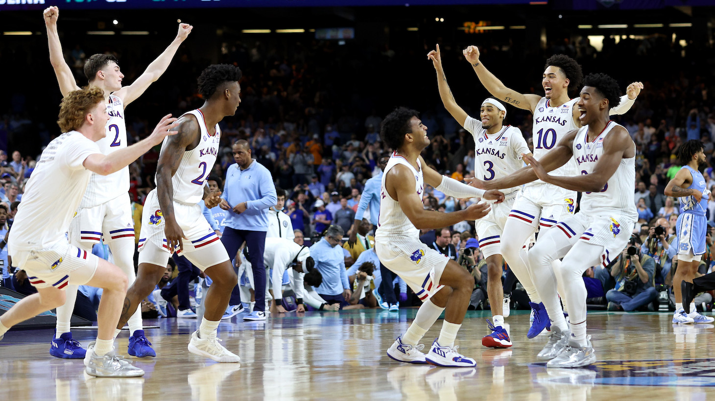 NEW ORLEANS, LOUISIANA - APRIL 04: The Kansas Jayhawks celebrate after defeating the North Carolina Tar Heels 72-69 during the 2022 NCAA Men's Basketball Tournament National Championship at Caesars Superdome on April 04, 2022 in New Orleans, Louisiana. (Photo by Jamie Squire/Getty Images)