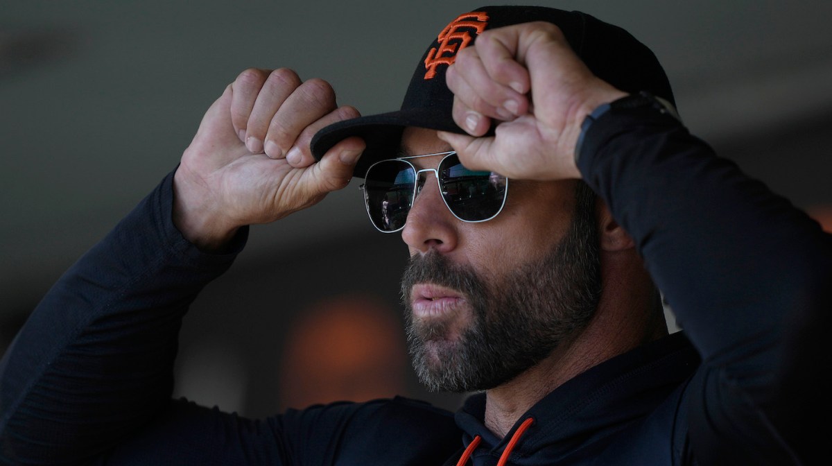SAN FRANCISCO, CALIFORNIA - APRIL 09: Manager Gabe Kapler #19 of the San Francisco Giants looks on from the dugout against the Miami Marlins at the start of the fifth inning at Oracle Park on April 09, 2022 in San Francisco, California. (Photo by Thearon W. Henderson/Getty Images)
