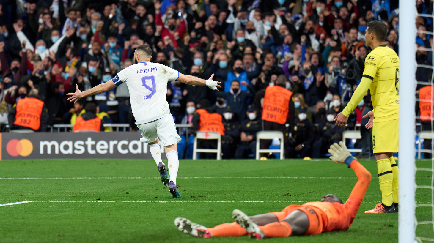 Karim Benzema of Real Madrid celebrates after scoring their team's second goal during the UEFA Champions League Quarter Final Leg Two match between Real Madrid and Chelsea FC at Estadio Santiago Bernabeu on April 12, 2022 in Madrid, Spain.