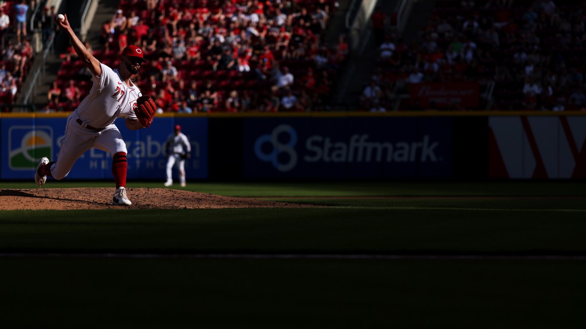 Reds reliever Art Warren pitches at home against the Cardinals.