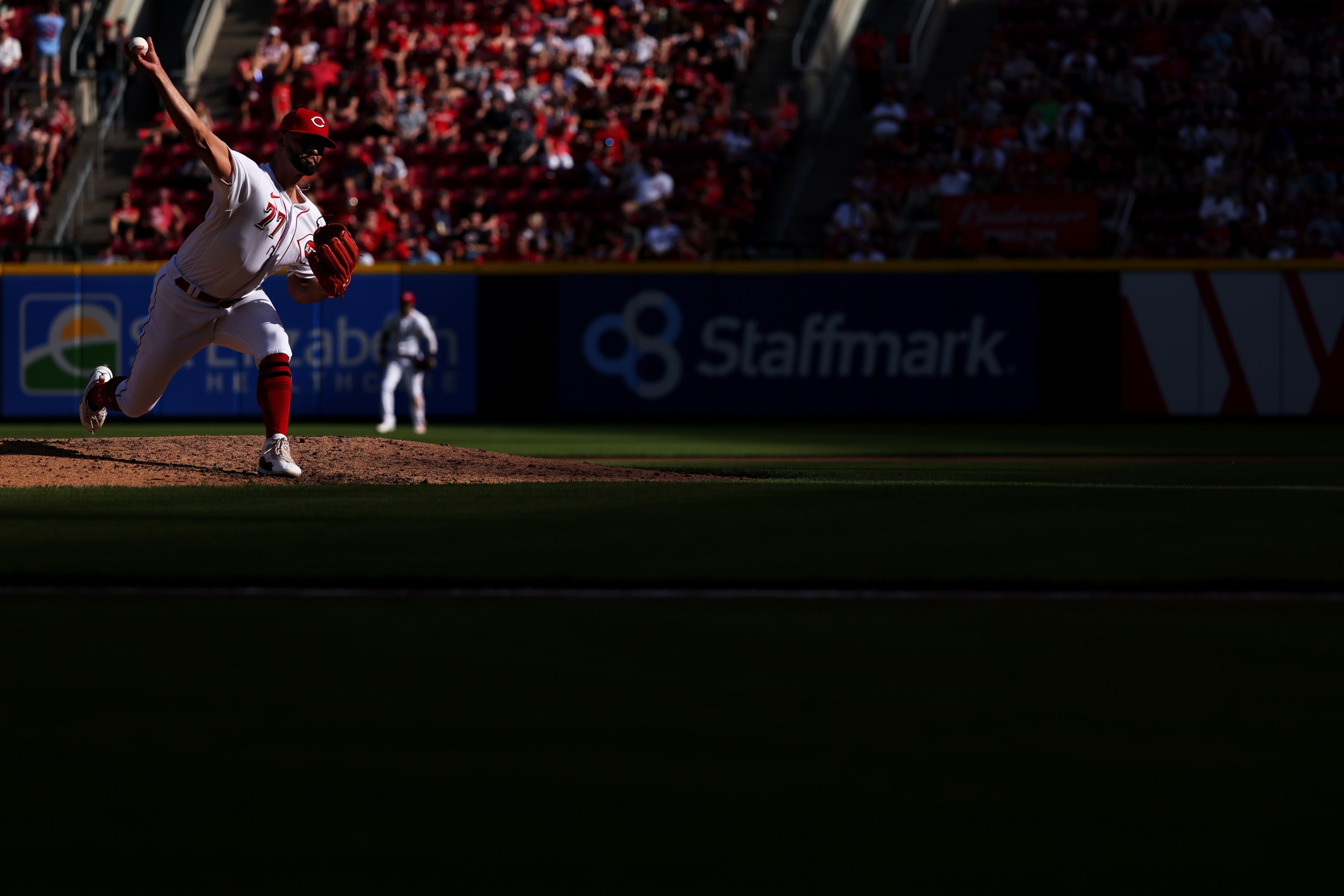 Reds reliever Art Warren pitches at home against the Cardinals.