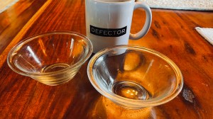 Two mis-en-place bowls and a Defector mug