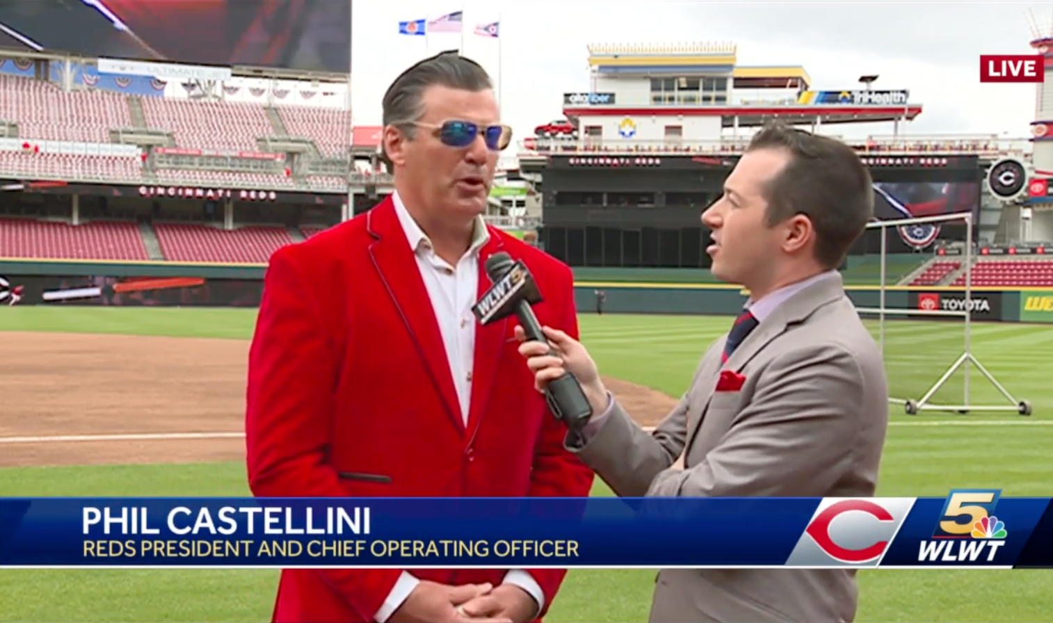 Cincinnati Reds team president Phil Castellini, seen here preparing to make an ass of himself on TV.