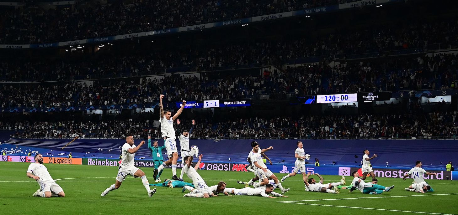 Real Madrid players celebrate wining the UEFA Champions League semi-final second leg football match between Real Madrid CF and Manchester City at the Santiago Bernabeu stadium in Madrid on May 4, 2022.