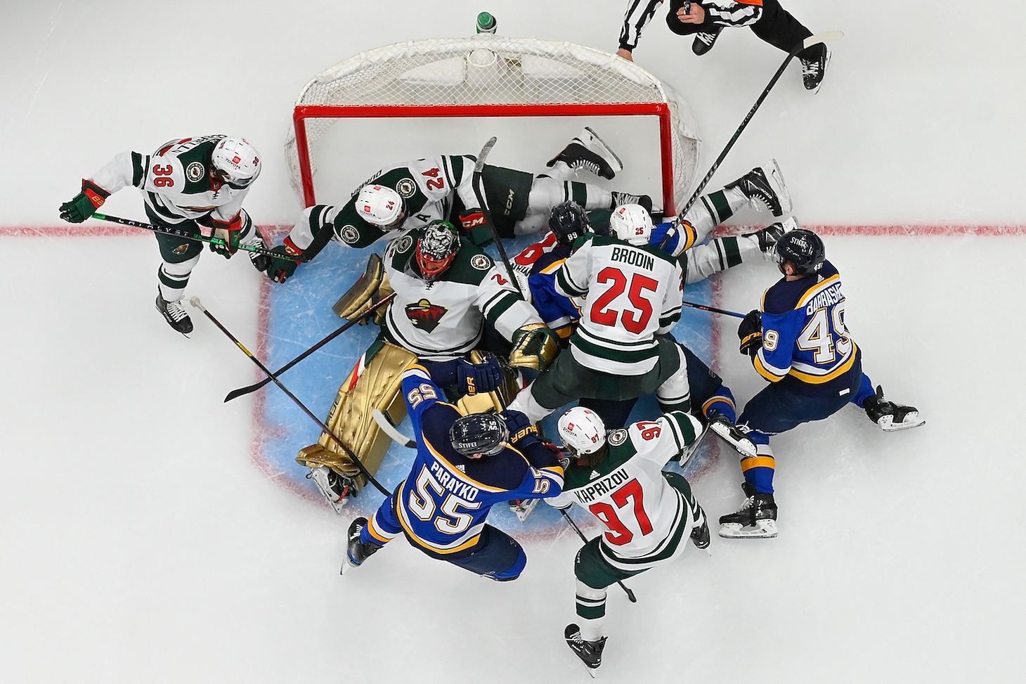 ST LOUIS, MO - MAY 08: Mats Zuccarello #36 Matt Dumba #24 Marc-Andre Fleury #29 Jonas Brodin #25 and Kirill Kaprizov #97 of the Minnesota Wild defend the net against Colton Parayko #55 Pavel Buchnevich #89 and Ivan Barbashev #49 of the St. Louis Blues in the third period of Game Four of the First Round of the 2022 Stanley Cup Playoffs at Enterprise Center on May 8, 2022 in St Louis, Missouri. (Photo by Joe Puetz/Getty Images)