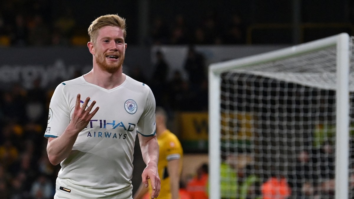 Manchester City's Belgian midfielder Kevin De Bruyne celebrates after scoring his team fourth goal during the English Premier League football match between Wolverhampton Wanderers and Manchester City at the Molineux stadium in Wolverhampton, central England on May 11, 2022.