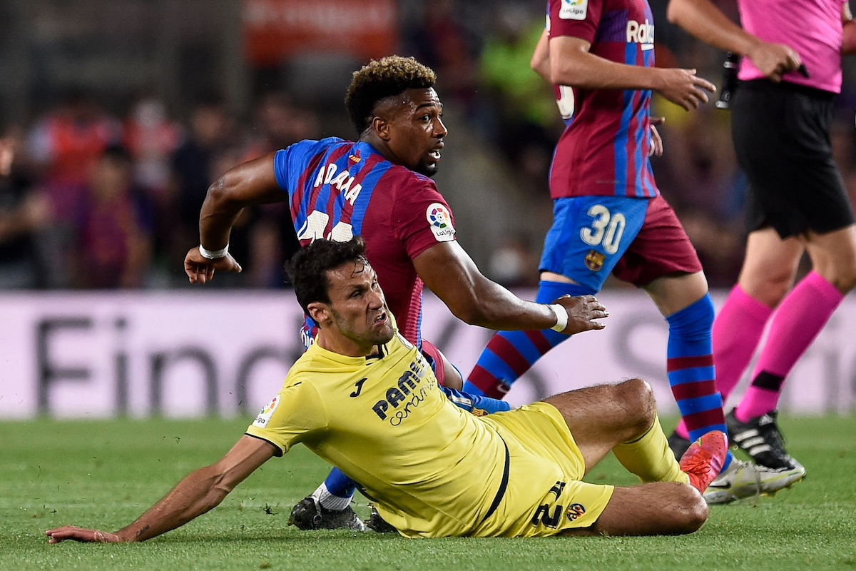 Adama Traore of Barcelona, Alfonso Pedraza of Villarreal, both going to the ground in pursuit of the ball