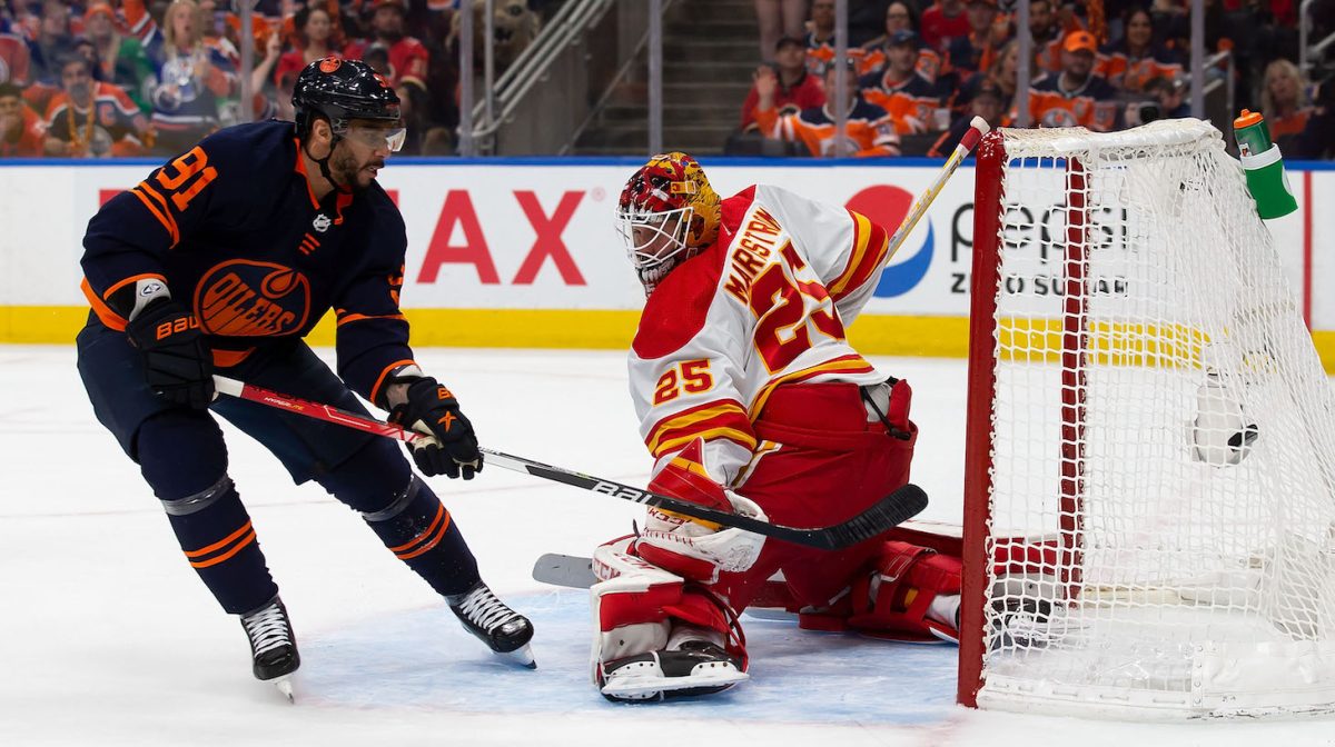 EDMONTON, AB - MAY 22: Evander Kane #91 of the Edmonton Oilers scores his third of the evening against goaltender Jacob Markstrom #25 of the Calgary Flames during the second period in Game Three of the Second Round of the 2022 Stanley Cup Playoffs at Rogers Place on May 22, 2022 in Edmonton, Canada. (Photo by Codie McLachlan/Getty Images)