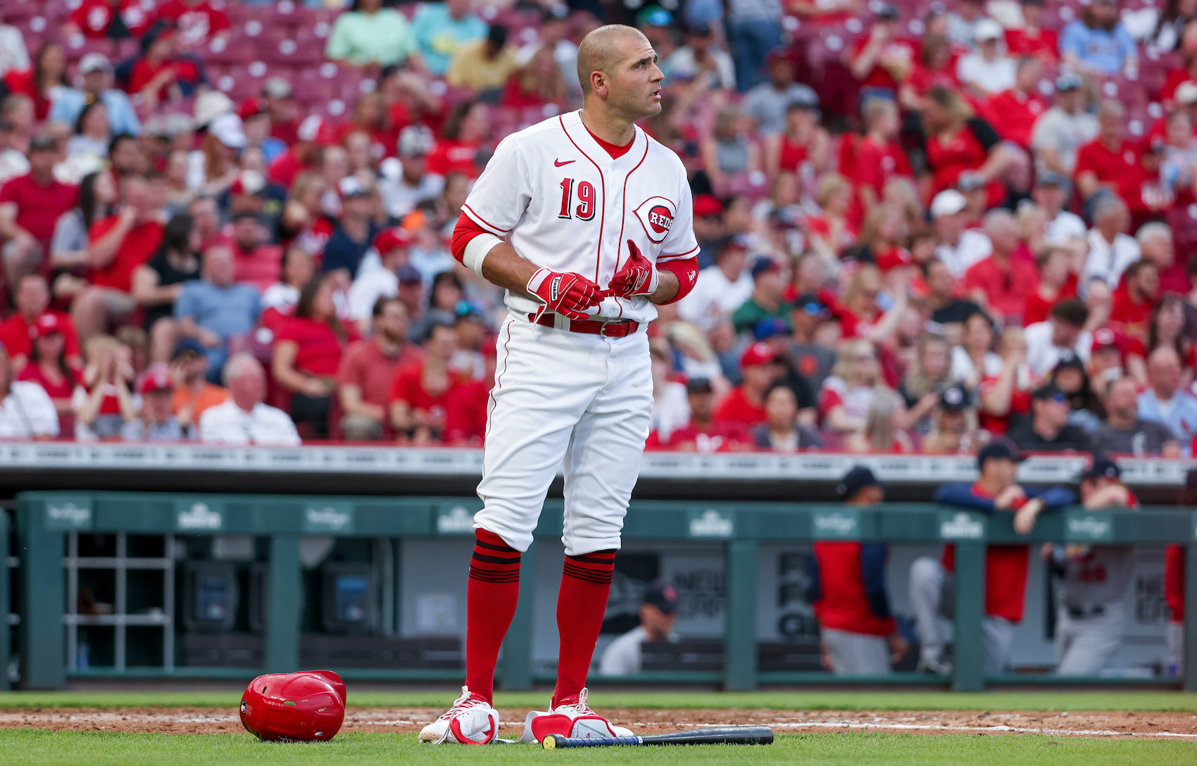 Joey Votto strikes out in a game against the Cardinals.