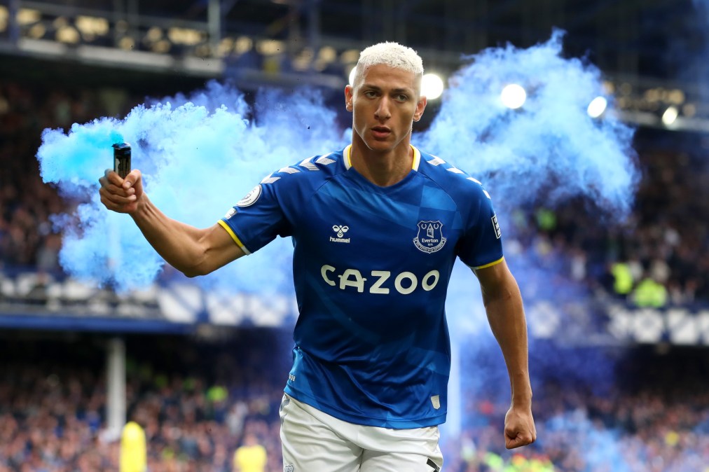 LIVERPOOL, ENGLAND - MAY 01: Richarlison of Everton celebrates with a flare after scoring their team's first goal during the Premier League match between Everton and Chelsea at Goodison Park on May 01, 2022 in Liverpool, England.