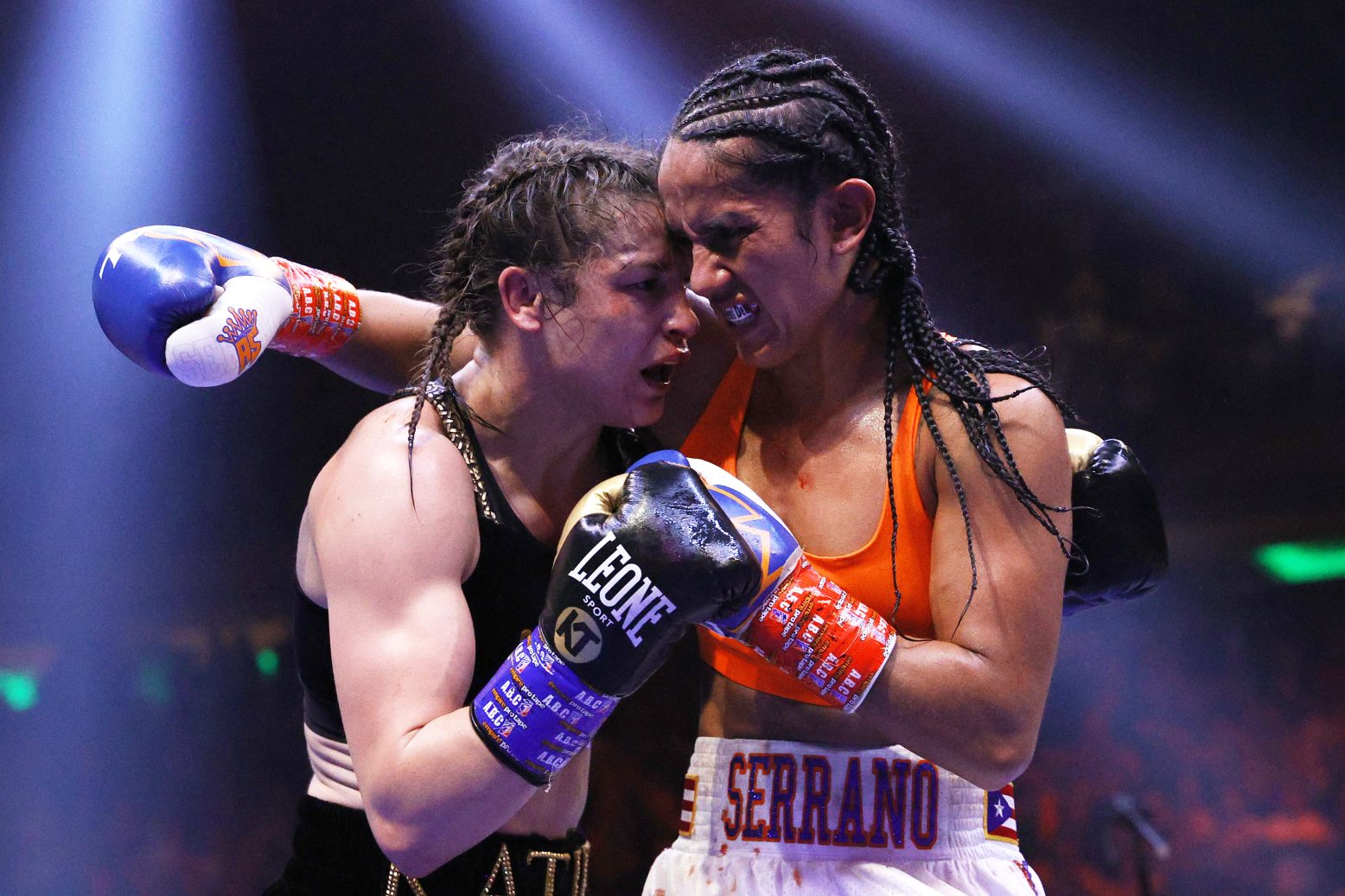 Katie Taylor and Amanda Serrano trade punches