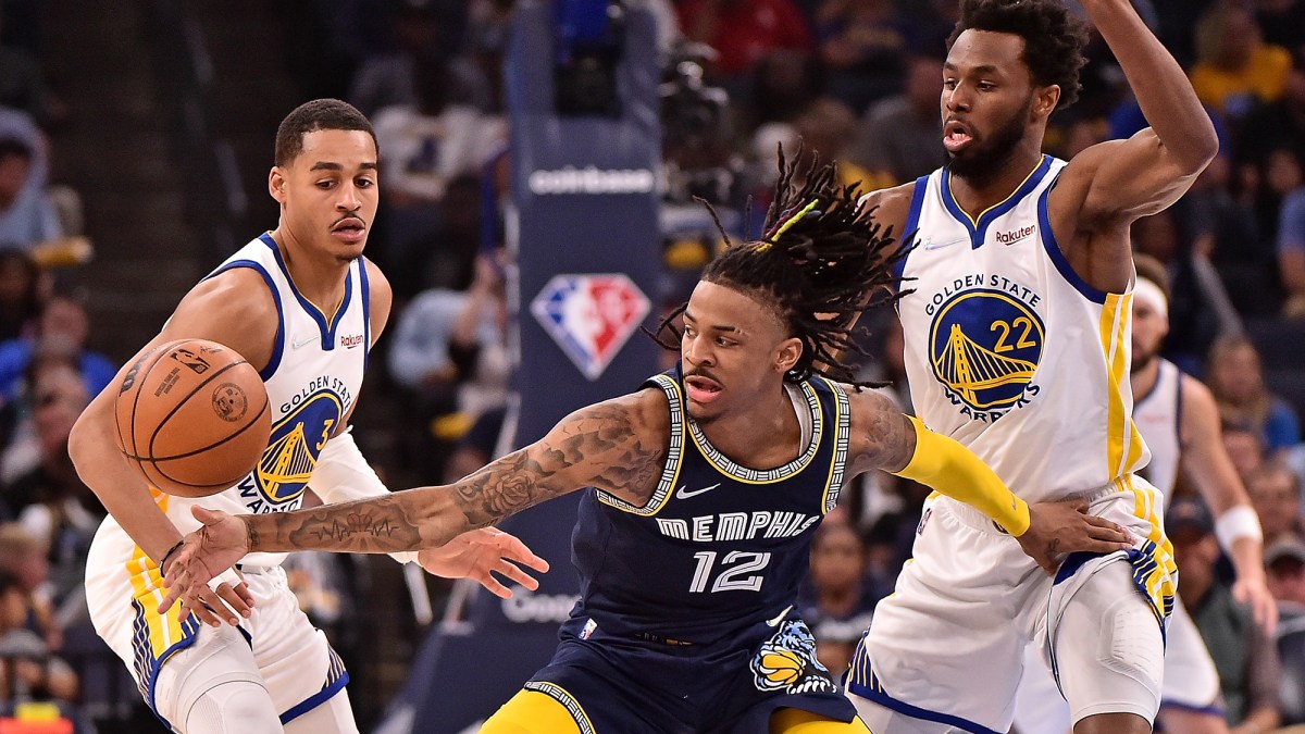 Ja Morant #12 of the Memphis Grizzlies handles the ball against Jordan Poole #3 of the Golden State Warriors during Game Two of the Western Conference Semifinals of the NBA Playoffs at FedExForum on May 03, 2022 in Memphis, Tennessee.