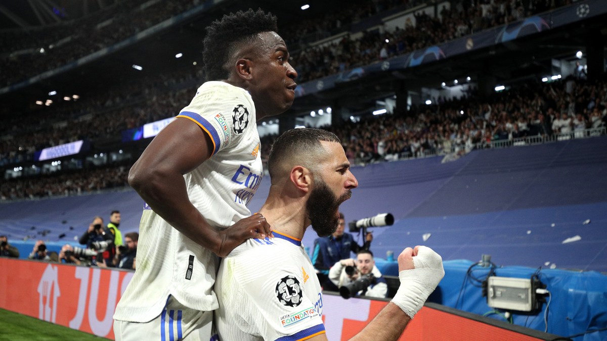 Karim Benzema of Real Madrid celebrates after scoring their side's third goal during the UEFA Champions League Semi Final Leg Two match between Real Madrid and Manchester City at Estadio Santiago Bernabeu on May 04, 2022 in Madrid, Spain.