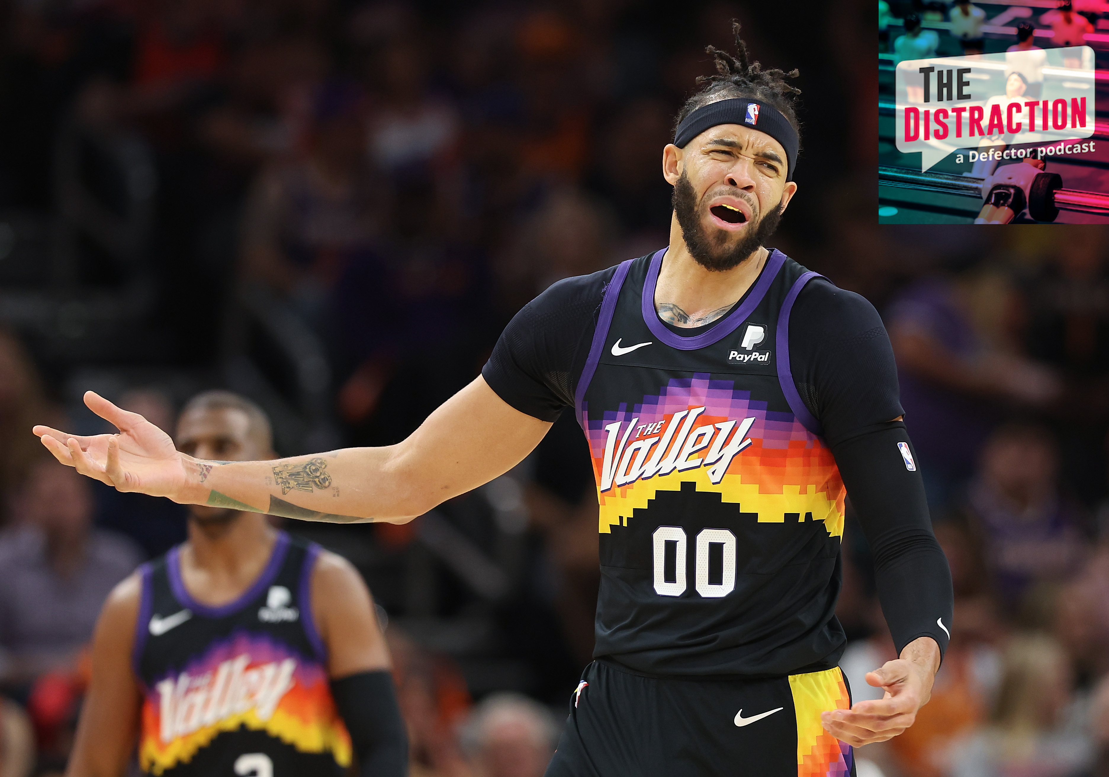 JaVale McGee arguing a call in the first game of Phoenix's playoff series against Dallas.