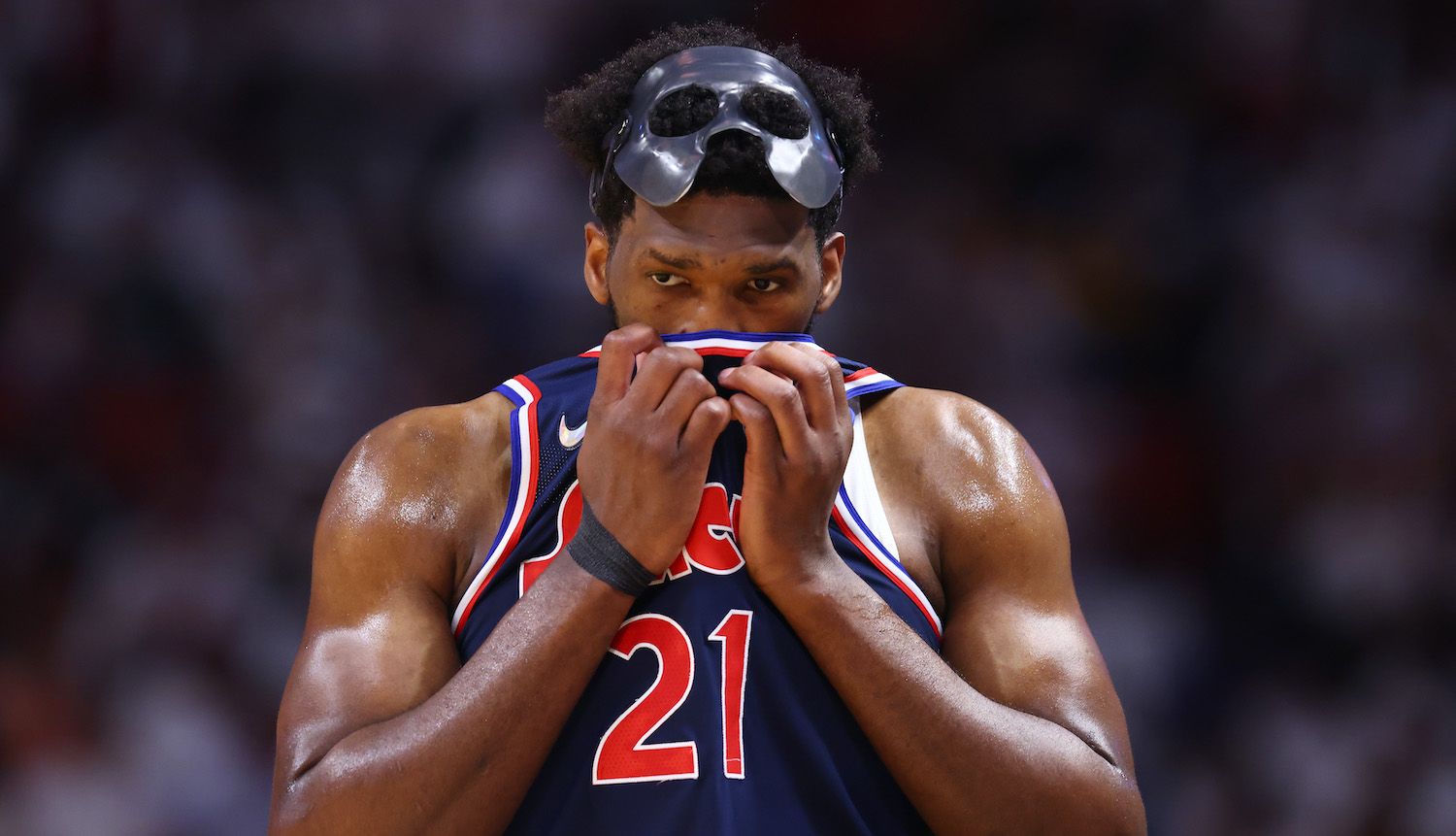 MIAMI, FLORIDA - MAY 10: Joel Embiid #21 of the Philadelphia 76ers reacts against the Miami Heat during the first half in Game Five of the Eastern Conference Semifinals at FTX Arena on May 10, 2022 in Miami, Florida. NOTE TO USER: User expressly acknowledges and agrees that, by downloading and or using this photograph, User is consenting to the terms and conditions of the Getty Images License Agreement. (Photo by Michael Reaves/Getty Images)