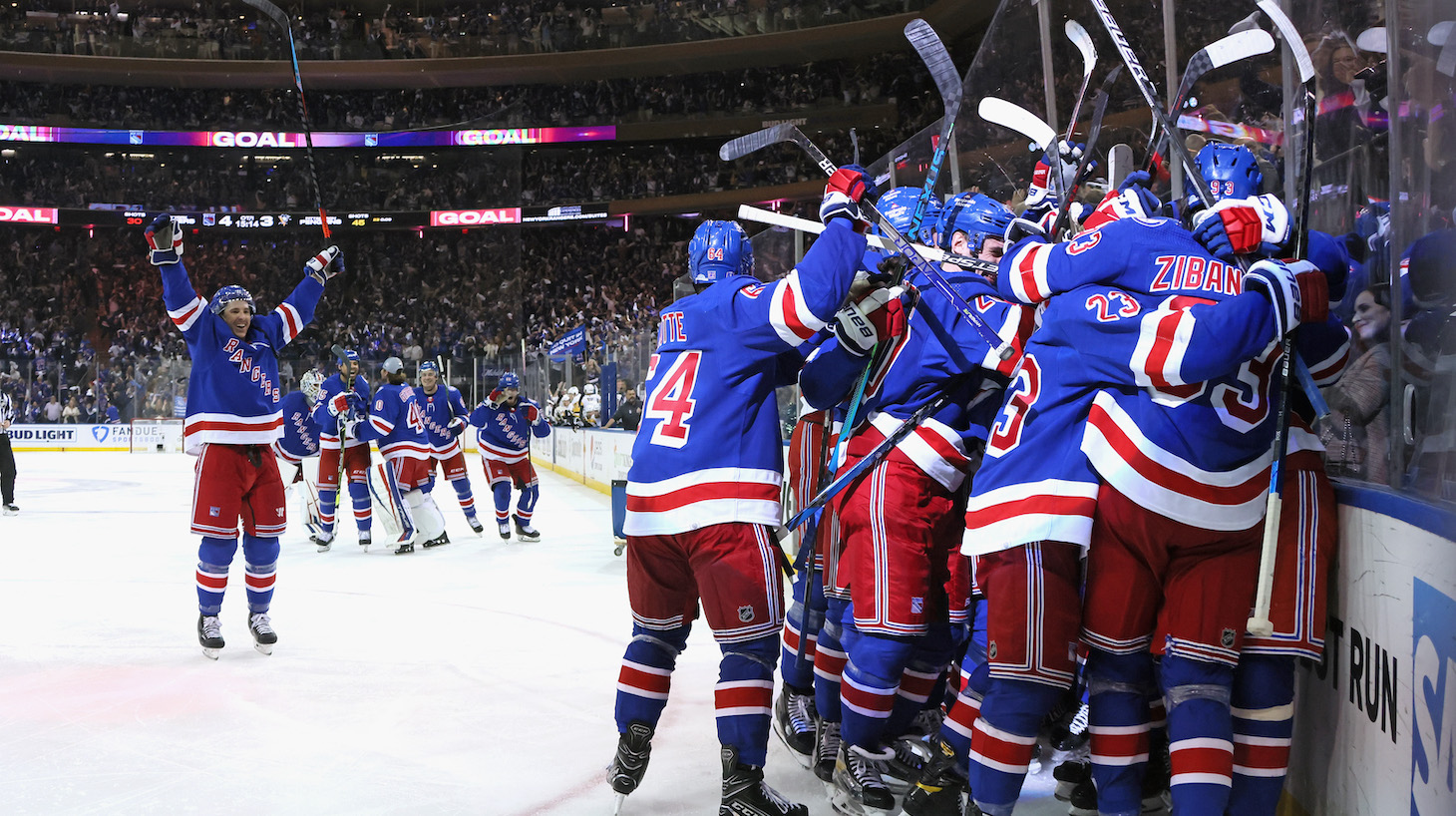 NEW YORK, NEW YORK - MAY 15: Artemi Panarin #10 of the New York Rangers celebrates his game winning overtime goal against the Pittsburgh Penguins in Game Seven of the First Round of the 2022 Stanley Cup Playoffs at Madison Square Garden on May 15, 2022 in New York City. (Photo by Bruce Bennett/Getty Images)