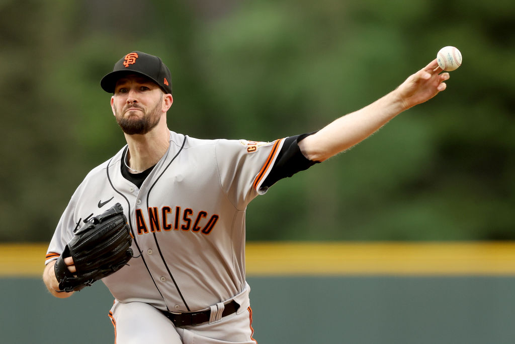 Alex Wood pitches