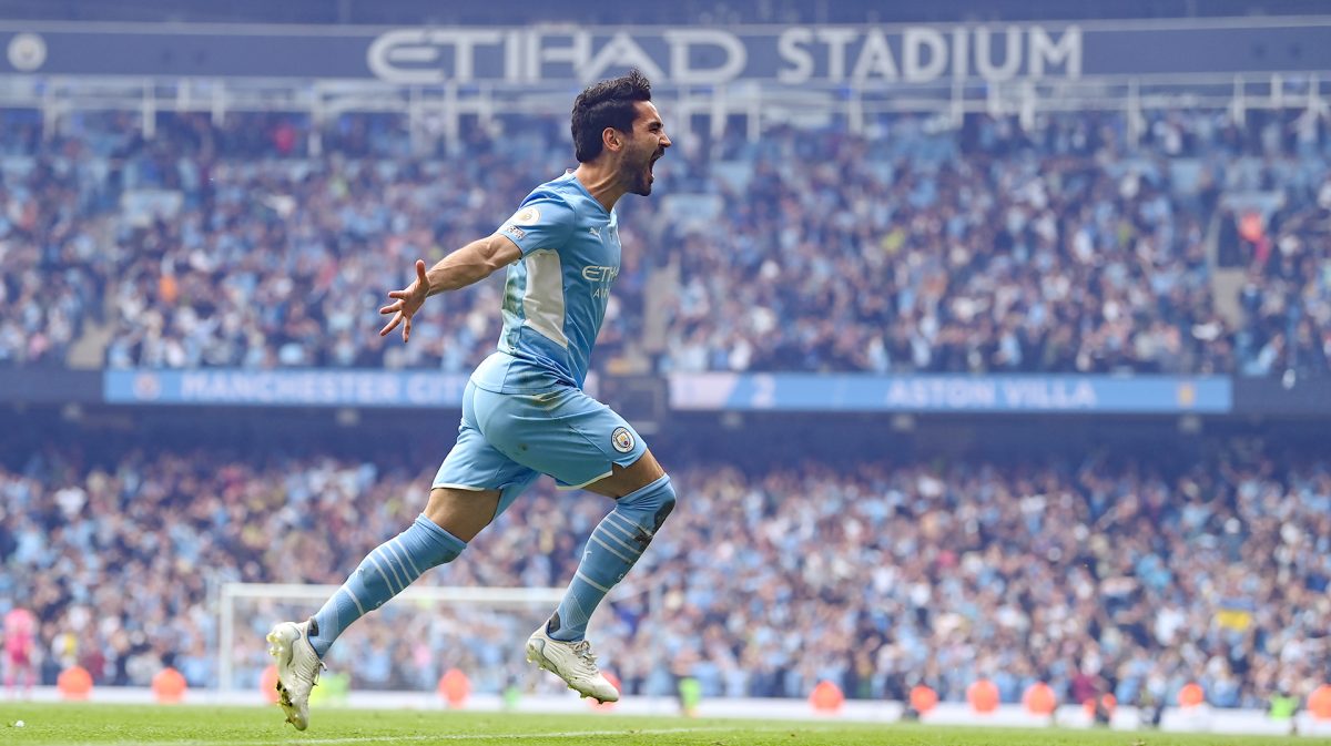 Ilkay Guendogan of Manchester City celebrates after scoring their team's third goal during the Premier League match between Manchester City and Aston Villa at Etihad Stadium on May 22, 2022 in Manchester, England.