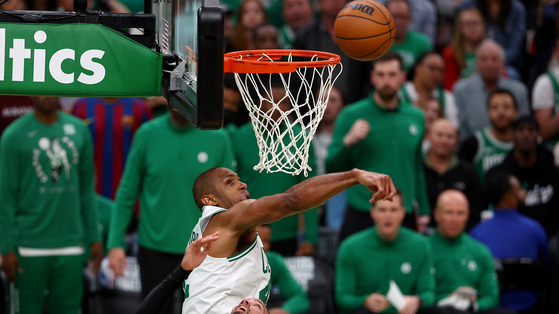 Al Horford #42 of the Boston Celtics blocks a shot by Caleb Martin #16 of the Miami Heat during the fourth quarter in Game Four of the 2022 NBA Playoffs Eastern Conference Finals at TD Garden on May 23, 2022 in Boston, Massachusetts.