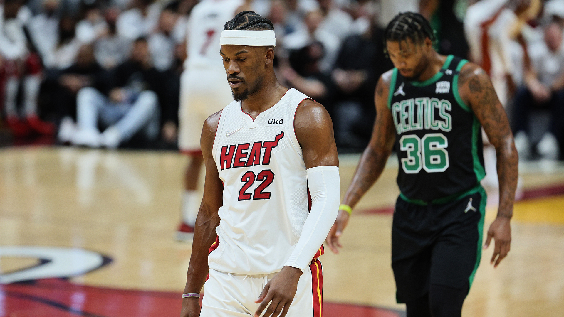 Jimmy Butler #22 of the Miami Heat looks on ahead of Marcus Smart #36 of the Boston Celtics during the first quarter in Game Five of the 2022 NBA Playoffs Eastern Conference Finals at FTX Arena on May 25, 2022 in Miami, Florida.