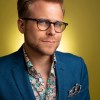 A photo of comedian Adam Conover