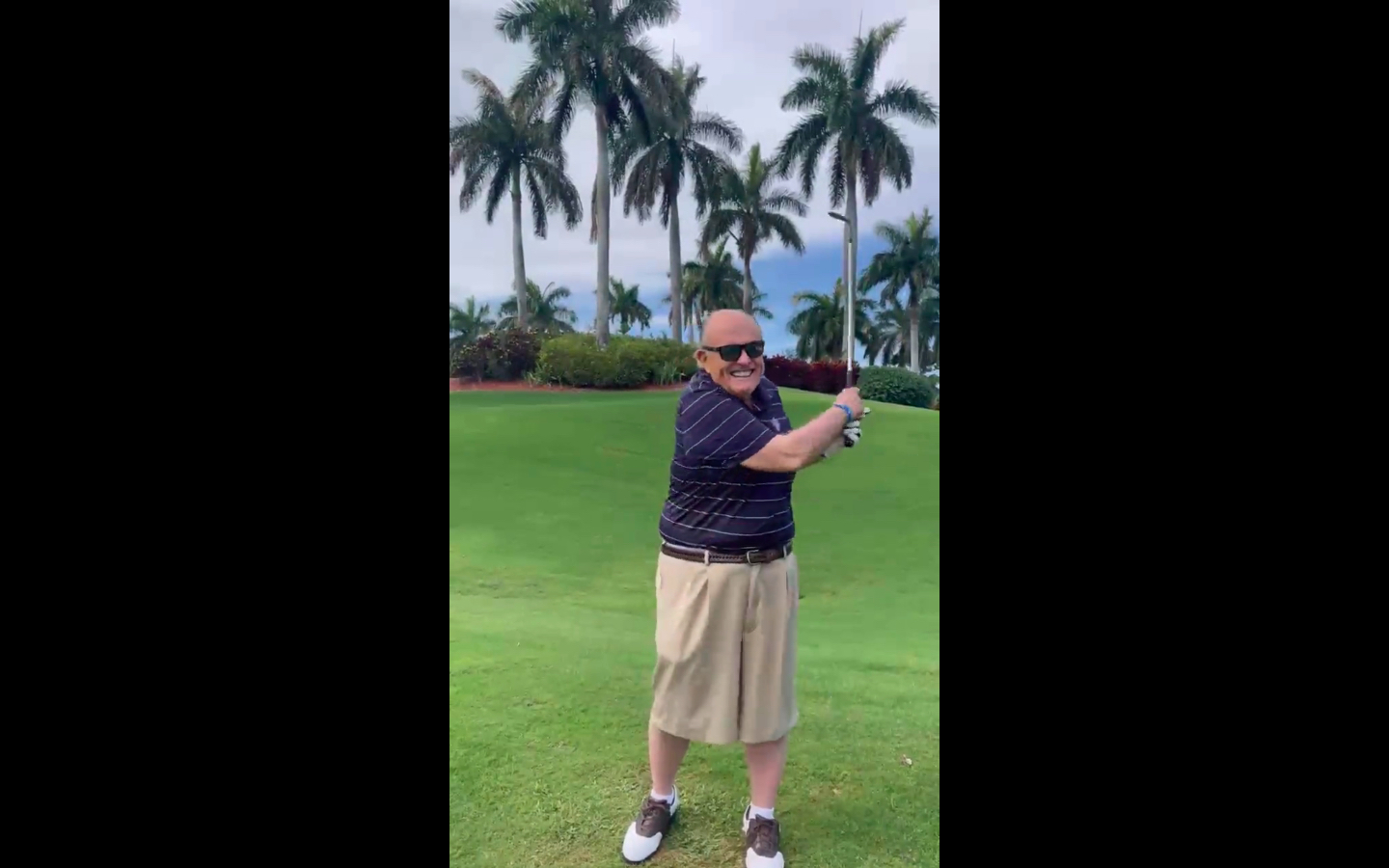 Rudy Giuliani looking weird on a golf course