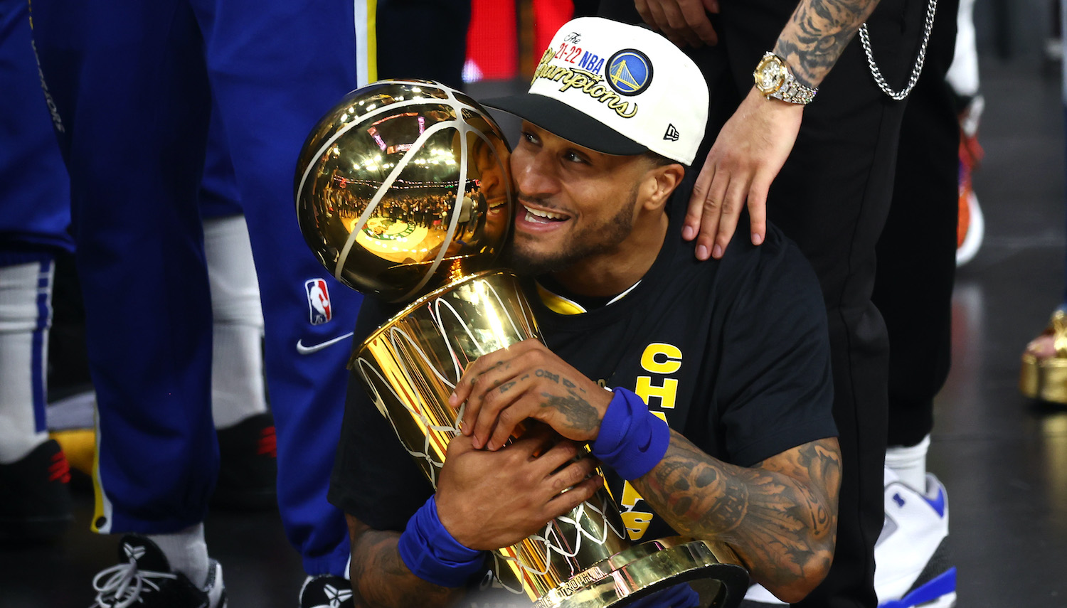 BOSTON, MASSACHUSETTS - JUNE 16: Gary Payton II #0 of the Golden State Warriors celebrates with the Larry O'Brien Championship Trophy after defeating the Boston Celtics 103-90 in Game Six of the 2022 NBA Finals at TD Garden on June 16, 2022 in Boston, Massachusetts. NOTE TO USER: User expressly acknowledges and agrees that, by downloading and/or using this photograph, User is consenting to the terms and conditions of the Getty Images License Agreement. (Photo by Adam Glanzman/Getty Images)