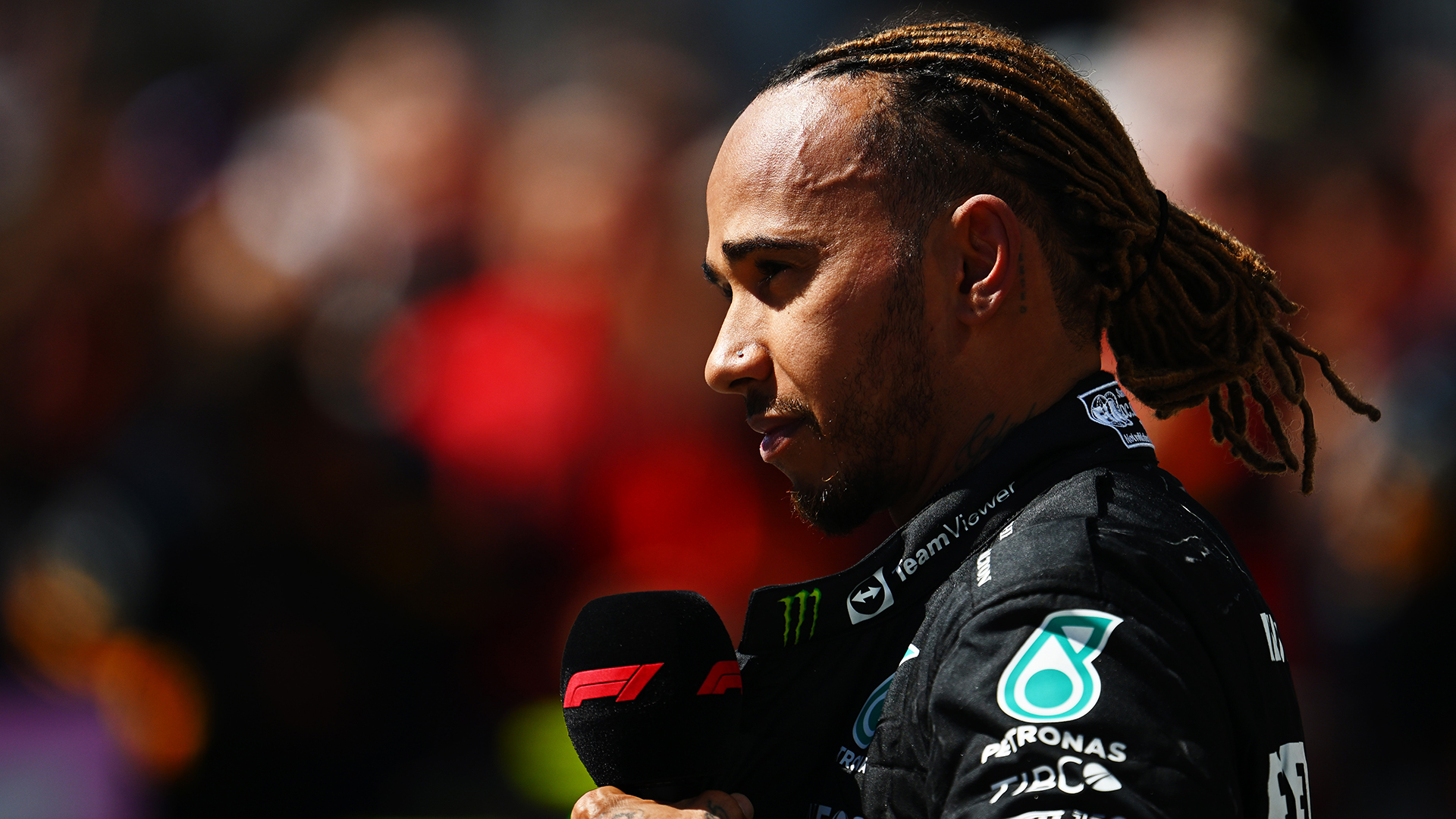Third placed Lewis Hamilton of Great Britain and Mercedes talks to the media in parc ferme during the F1 Grand Prix of Canada at Circuit Gilles Villeneuve on June 19, 2022 in Montreal, Quebec.
