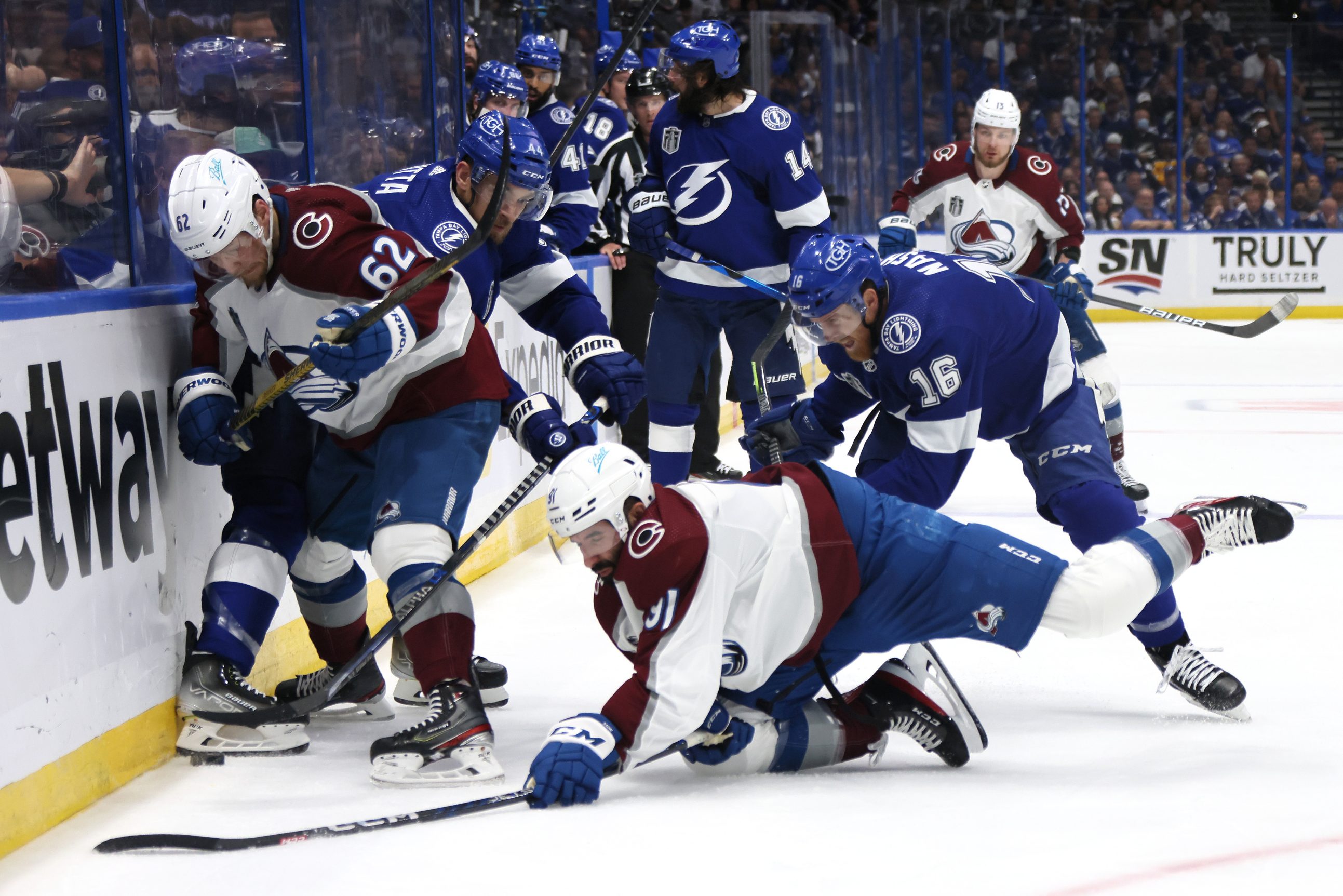 Nazem Kadri is knocked to the ice