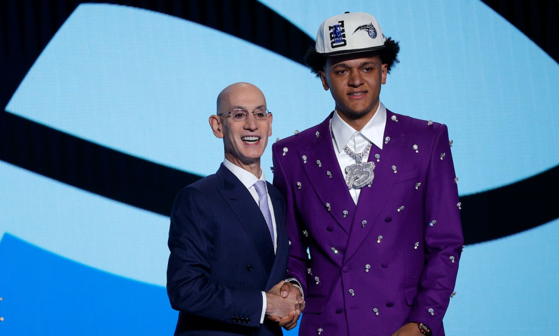 NEW YORK, NEW YORK - JUNE 23: NBA commissioner Adam Silver and Paolo Banchero pose for photos after Banchero was drafted with the 1st overall pick by the Orlando Magic during the 2022 NBA Draft at Barclays Center on June 23, 2022 in New York City. NOTE TO USER: User expressly acknowledges and agrees that, by downloading and or using this photograph, User is consenting to the terms and conditions of the Getty Images License Agreement. (Photo by Sarah Stier/Getty Images)