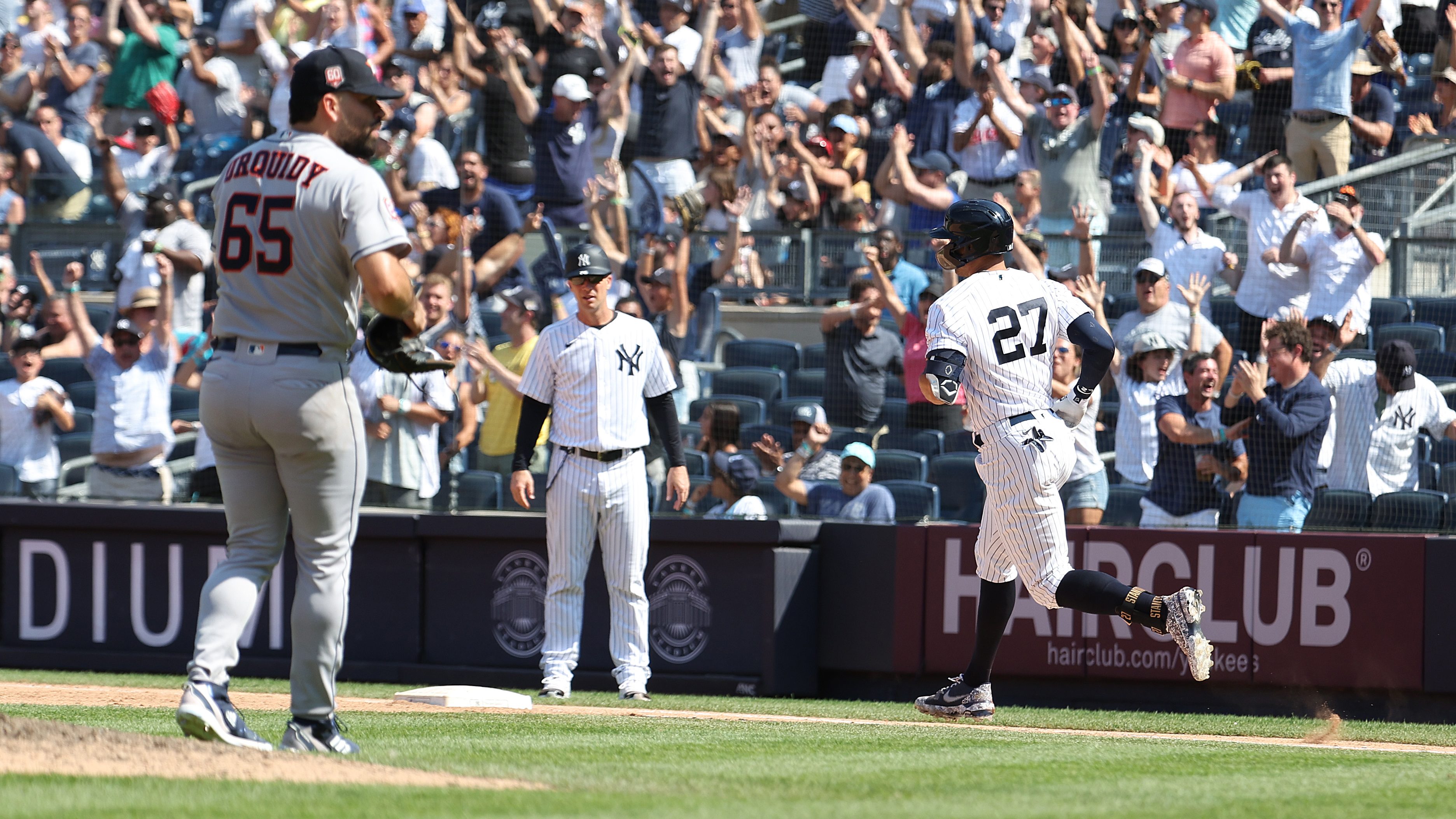 Giancarlo Stanton #27 of the New York Yankees rounds the bases after hitting a seventh inning home run against Jose Urquidy #65 of the Houston Astros during their game at Yankee Stadium on June 26, 2022 in New York City.