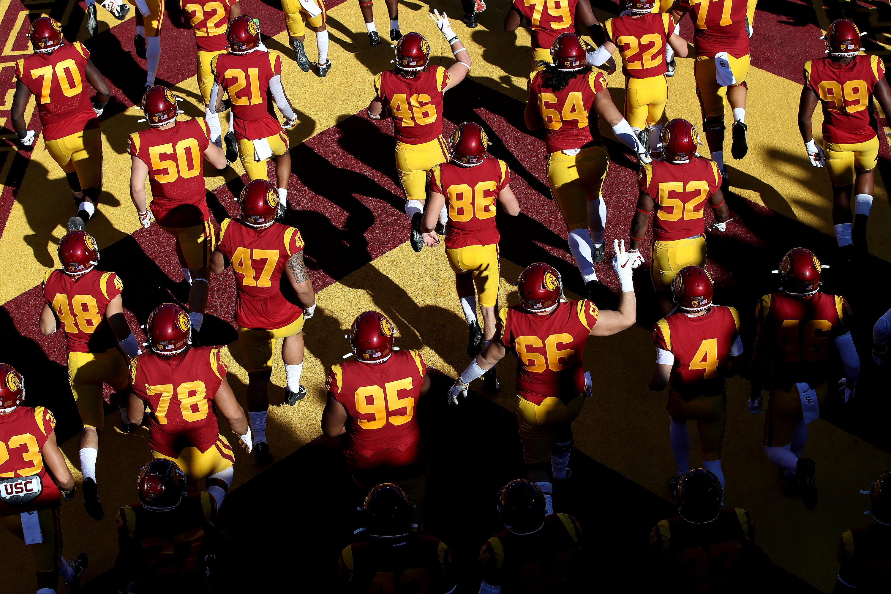 LOS ANGELES, CALIFORNIA - NOVEMBER 23: The USC Trojans run onto the field prior to a game against the UCLA Bruins at Los Angeles Memorial Coliseum on November 23, 2019 in Los Angeles, California. (Photo by Sean M. Haffey/Getty Images)