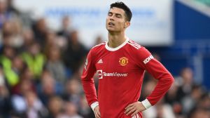 Manchester United's Portuguese striker Cristiano Ronaldo reacts during the English Premier League football match between Brighton and Hove Albion and Manchester United at the American Express Community Stadium in Brighton, southern England on May 7, 2022.