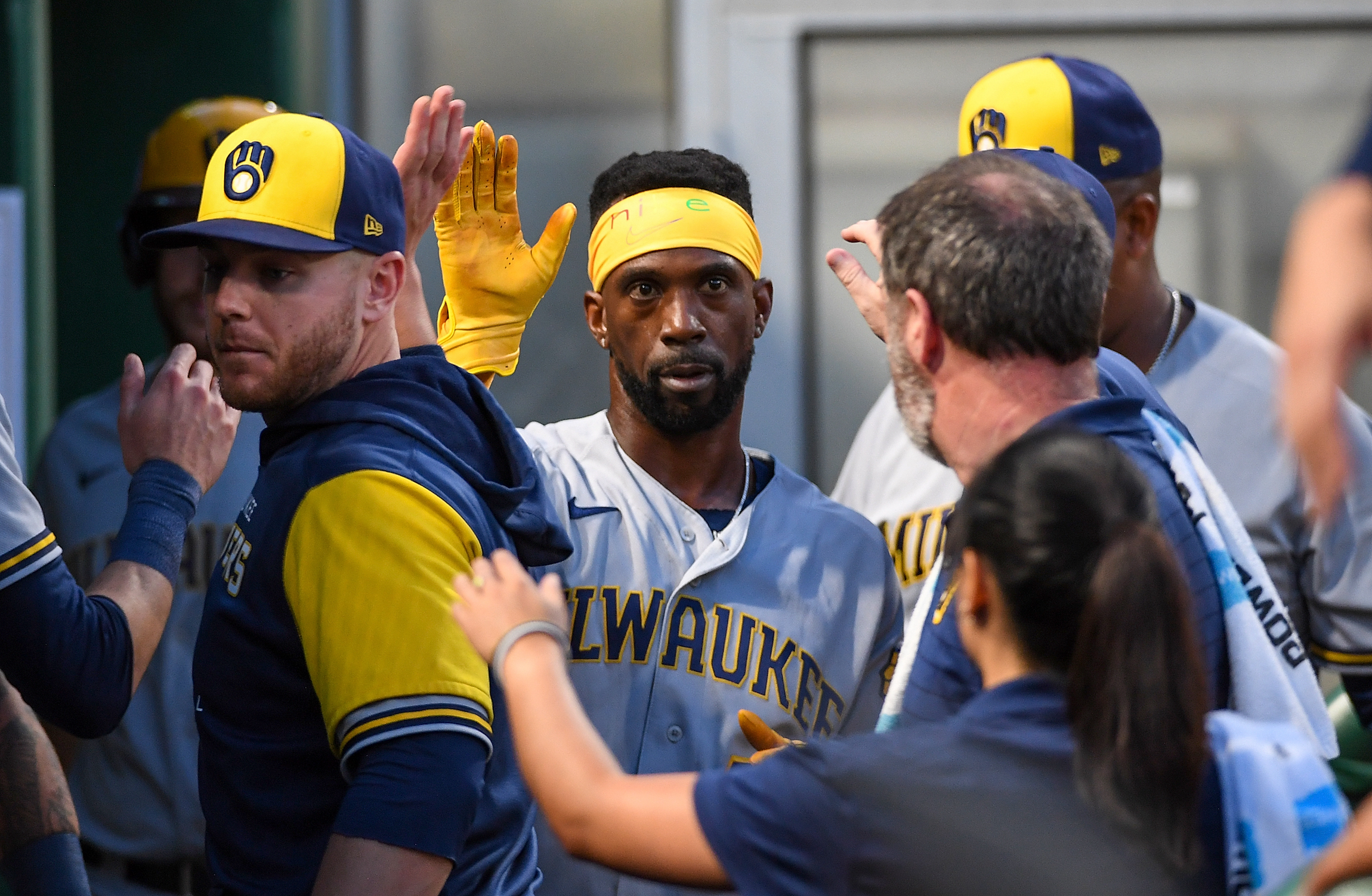 Andrew McCutchen, seen here celebrating with his Brewers teammates after seeing someone in a fursuit.