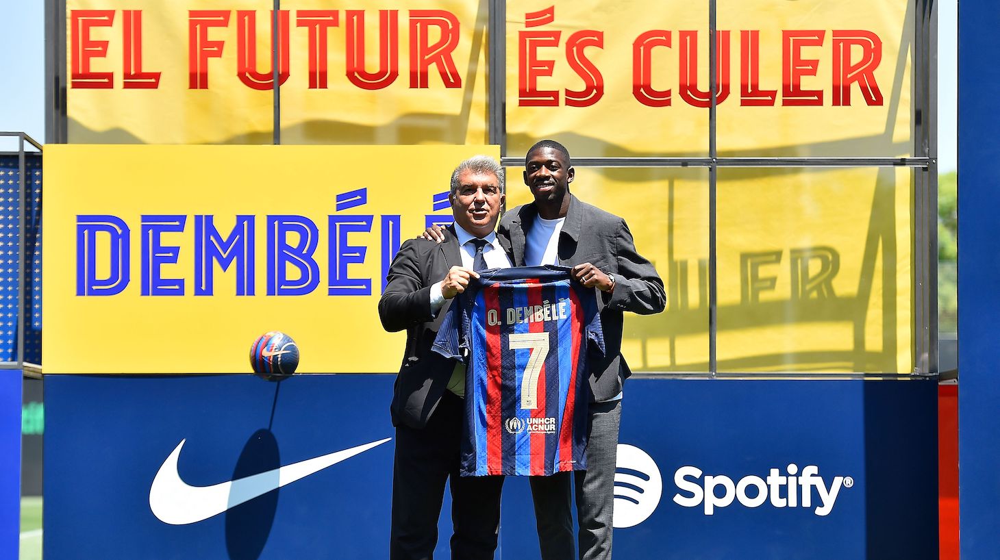 FC Barcelona's French forward Ousmane Dembele and FC Barcelona's President Joan Laporta pose during Ousmane Dembele's ceremony at the Joan Gamper training ground in Sant Joan Despi, near Barcelona on July 14, 2022. - French international winger Ousmane Dembele, whose contract with Barcelona expired last month, ended six months of speculation about his future by agreeing to 'rejoin' the Catalan side until 2024, the club announced on July 14, 2022.