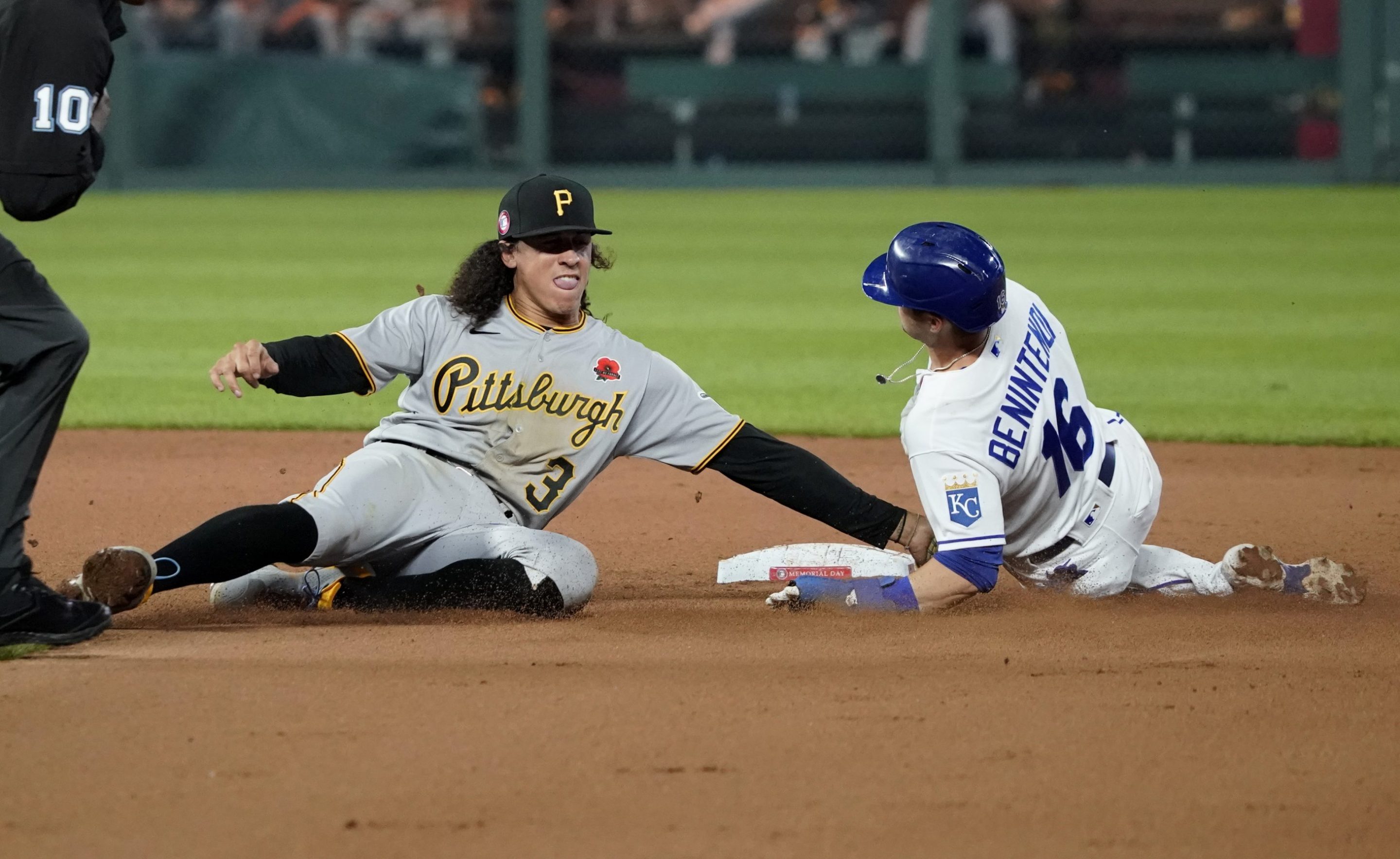 Kansas City Royals runner tagged out by Pittsburgh Pirates fielder