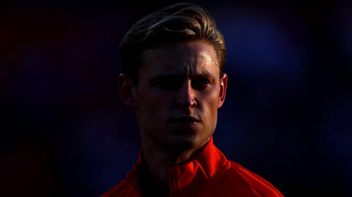 Frenkie de Jong of Netherlands stands for the national anthem prior to the UEFA Nations League League A Group 4 match between Netherlands and Poland at Stadium Feijenoord on June 11, 2022 in Rotterdam, Netherlands.