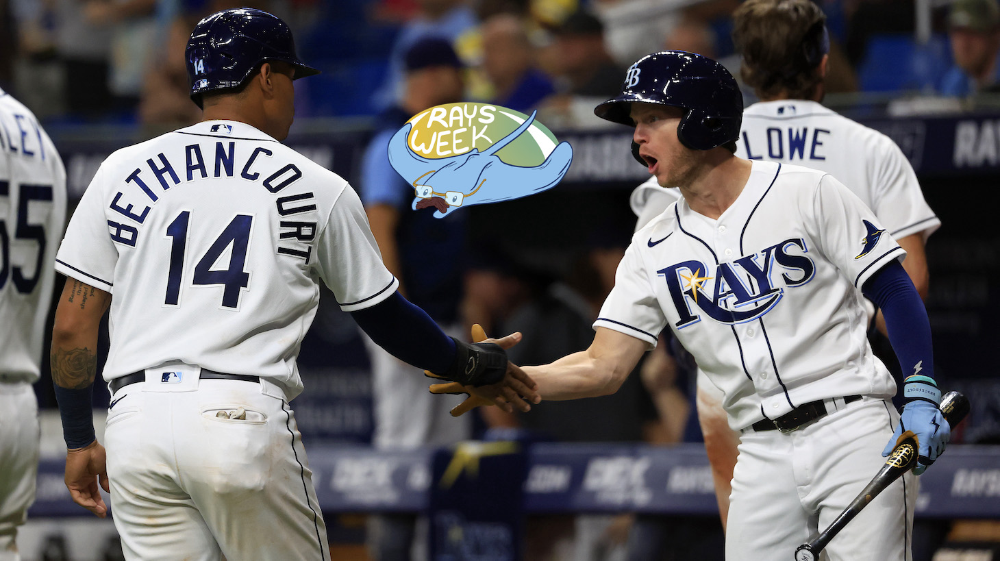ST PETERSBURG, FLORIDA - JULY 14: Christian Bethancourt #14 of the Tampa Bay Rays is congratulated after scoring a run in the seventh inning during a game against the Boston Red Sox at Tropicana Field on July 14, 2022 in St Petersburg, Florida. (Photo by Mike Ehrmann/Getty Images)