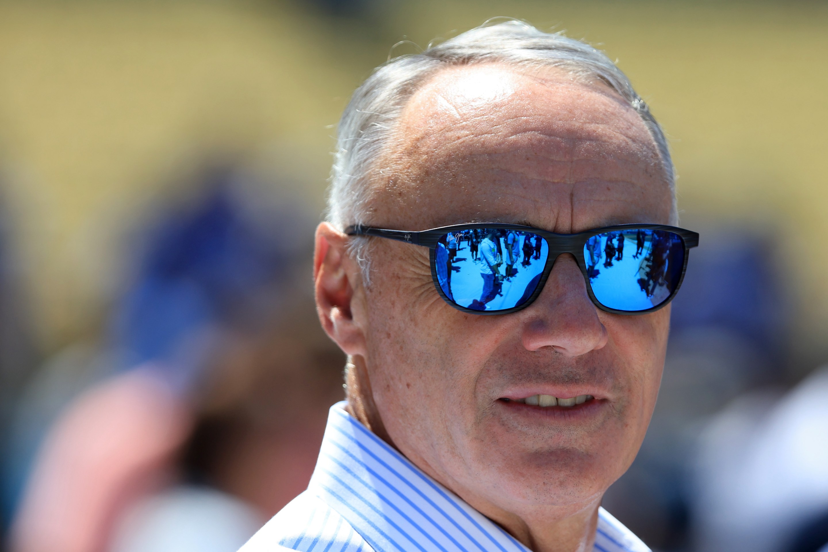 MLB Commissioner Rob Manfred, seen here wearing reflective sunglasses at the 2022 All-Star Game.