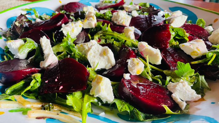 A salad with beets and goat cheese, but sadly no walnuts