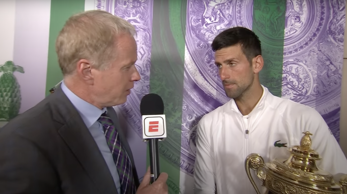 Novak Djokovic gives a post-match interview after winning Wimbledon.