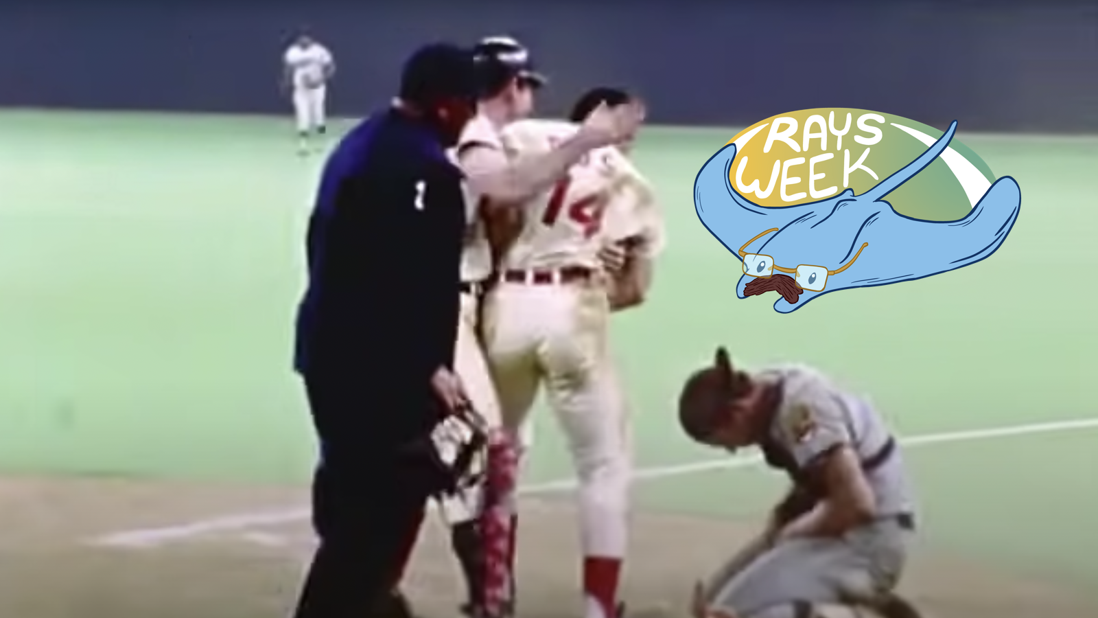 Pete Rose stands over Ray Fosse