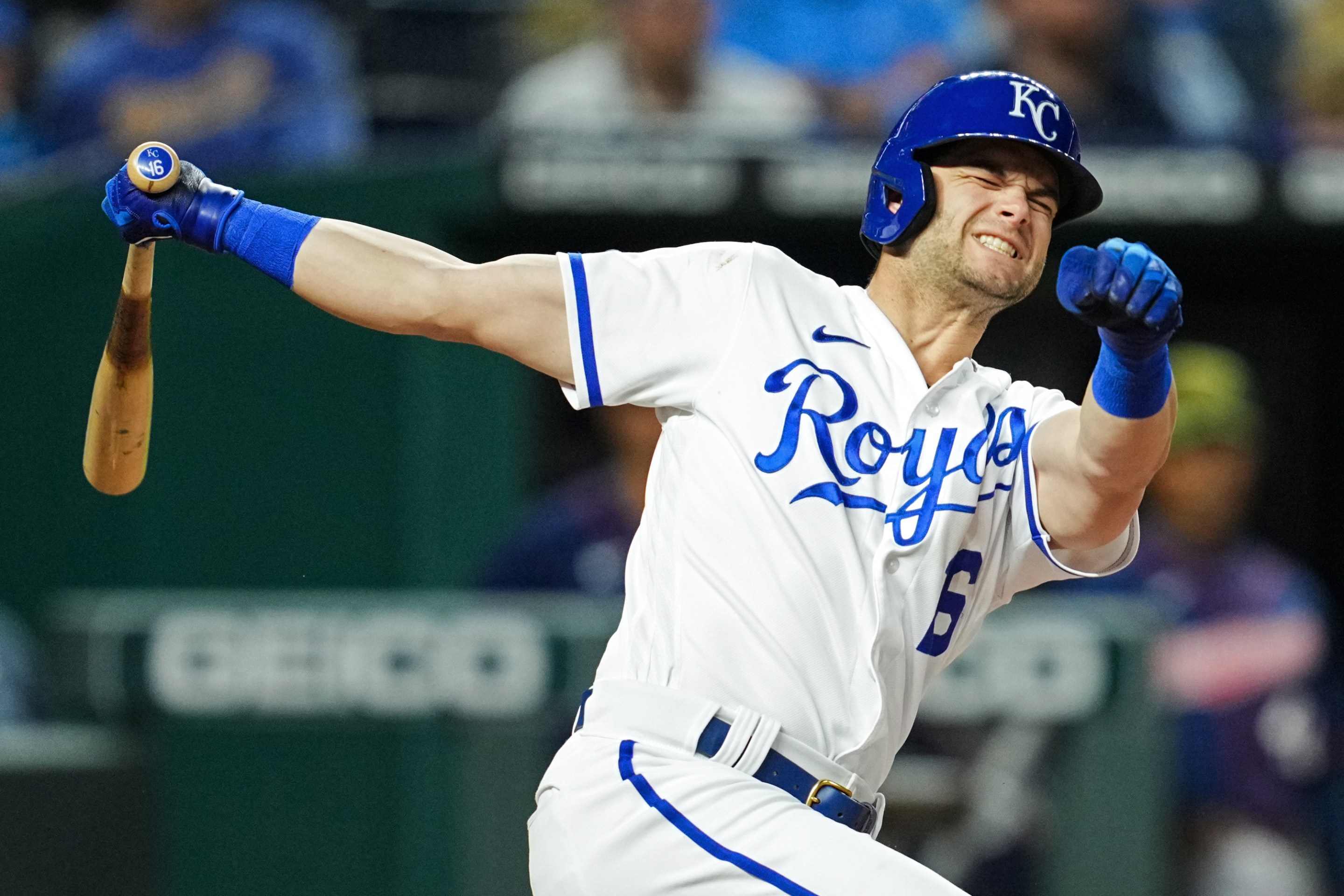 Andrew Benintendi #16 of the Kansas City Royals reacts after fouling a ball off of his leg during the seventh inning against the Minnesota Twins at Kauffman Stadium on May 20, 2022 in Kansas City, Missouri.