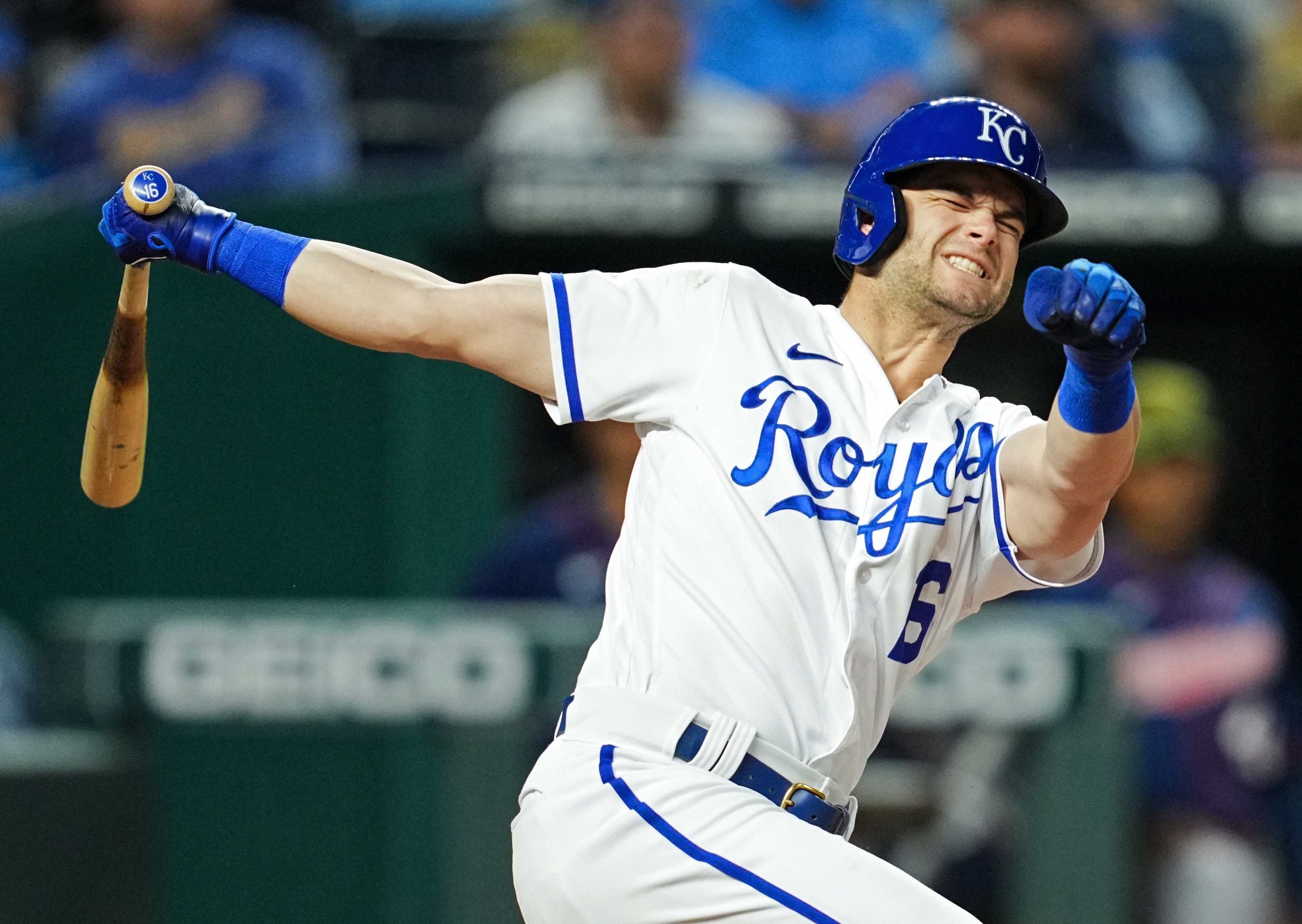 Andrew Benintendi #16 of the Kansas City Royals reacts after fouling a ball off of his leg during the seventh inning against the Minnesota Twins at Kauffman Stadium on May 20, 2022 in Kansas City, Missouri.