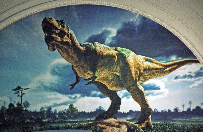 A renaissance-like painting of Sue the T. rex on the wall of the Field Museum